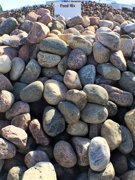 Stone for sale near me - River irregular shape; Face sizes range from 6″ x 6″ to 12″ x 12″ Packaged in 1 ton or 3,000 lb baskets; Thin River Rock – 1″ to 3″ thickness Medium River Rock – 3″ to 5″ thickness Heavy River Rock – 5″ to 8″ thickness